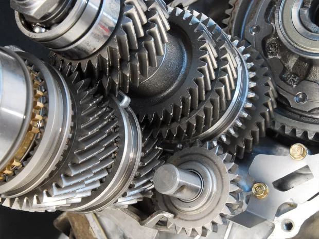 Close-up of metal gears and transmission components