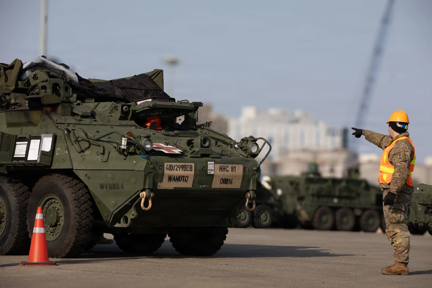 Armored vehicle being guided at a logistics site
